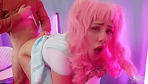 Redheaded whore with tattooed pussy fucks in reverse