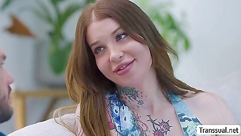 Bareback shemale with her natural tits sucking a big cock