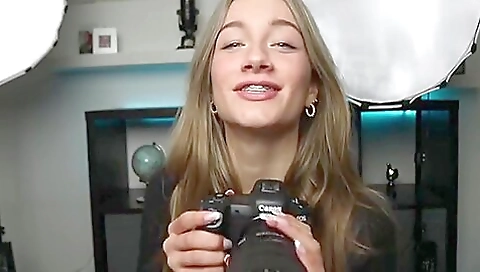 Brunette in a costume shows her body and plays in bed