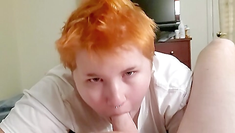 Red head babe with a tattooed pussy takes a handjob on ass