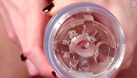 A girl in a sexy solo outfit is putting cum inside her