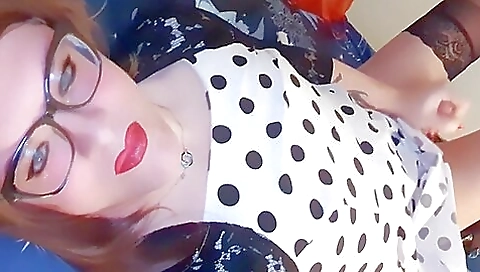 Red-haired blonde with long red hair masturbating in stockings